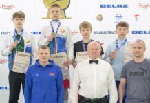 Кирилл МАРЦИНКЕВИЧ (на фото второй справа в голубой байке)